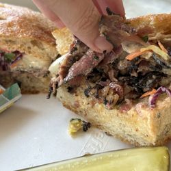 Everything about the sandwich, the pastrami, the slaw, the focaccia, is perfect! The Corner Deli in Kahuku at the sugar mill shops.