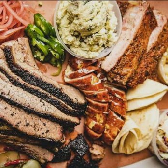 Reese Bros Barbecue - Platter of beef brisket, BBQ ribs, coleslaw, pickled onions, and potato salad - Barbeque Near Me - San Antonio, Texas Reese Bros Barbecue - Platter of beef brisket, BBQ ribs, coleslaw, pickled onions, and potato salad - Barbeque Near Me - San Antonio, Texas