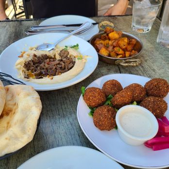 Ammatoli - House made flat bread, Hummus with beef, spicy potatoes and falafel - Mediterranean Near Me - Long Beach, California
