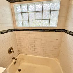 The Grout Medic of  West/Southwest Chicagoland - Before regrout & recaulk  shower has a LOT of moldy grout.
