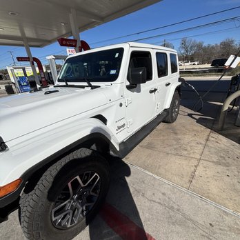 Exxon - Jeep 2 years old, 2,000 miles and still has the new car smell.  Mint! - Gas Stations Near Me - Austin, Texas