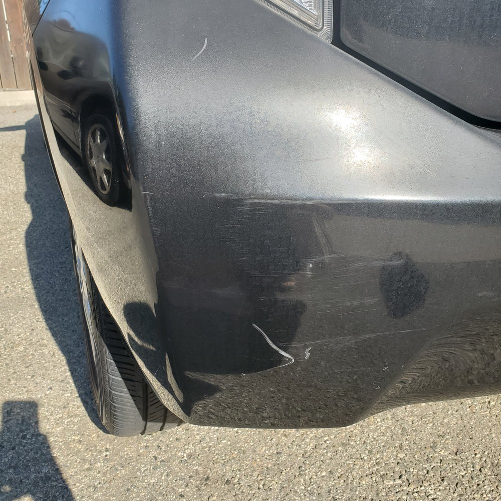 Pasadena Collision Center - Existing scratches with a brand new diagonal white scratch, plus scratch on the top. - Body Shops Near Me - Pasadena, California
