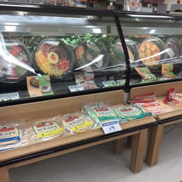 Look at the selection of meat/cheese/veggie/fruit trays! So fresh (cardboard)