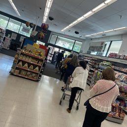 One cashier sitting down. Entire store had no sense of urgency. Avoid this location!!!!