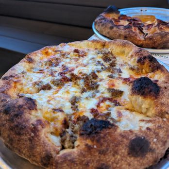 Pizzeria Luca - The Canavarro. The combination of sausage, cheeses and Calabrian chili works so well together. Beware, the chili has a surprising kick. - Italian Near Me - Lancaster, Pennsylvania