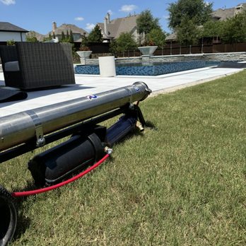 Shiny Home Masters - Our Di-Tank filters the water to stop streaking on your glass, also looks cool next to the beautiful pool! This was in Prosper Texas. - Window Washing Near Me