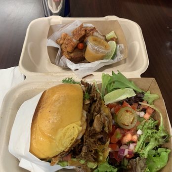Brazuca Grill - Pulled pork sandwich minus the egg and Chicharrón fresh off the grill from the Brazuca grill food truck across from my Division (MUNI) $20 - Brazilian Near Me - San Francisco, California