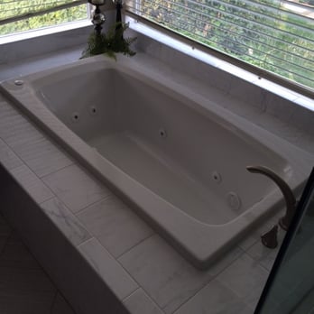 Pacific Pipes - a bathtub in a bathroom - Plumbing Near Me - Sacramento, California Pacific Pipes - a bathtub in a bathroom - Plumbing Near Me - Sacramento, California