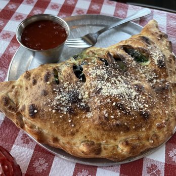 Del's Pizzeria - Sausage Calzone - Pizza Near Me - Pismo Beach, California Del's Pizzeria - Sausage Calzone - Pizza Near Me - Pismo Beach, California