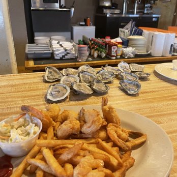 The Troff - a plate of food on a table - Seafood Near Me - Eustis, Florida