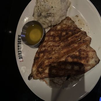 J. Alexander's - Blackened/Grilled Trout, Louisiana rice, and smashed red potatoes with drawn butter. - New American Near Me - Atlanta, Georgia J. Alexander's - Blackened/Grilled Trout, Louisiana rice, and smashed red potatoes with drawn butter. - New American Near Me - Atlanta, Georgia