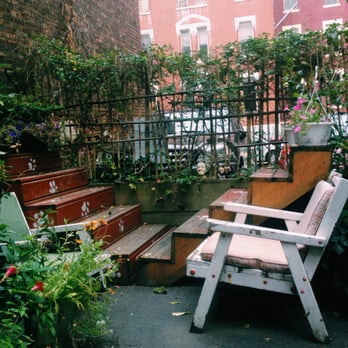 Intrinsic Cafe - It's really nice that they have a separate seating area in the back. There are more chairs and tables other than this. - Coffee & Tea Near Me - Newark, New Jersey