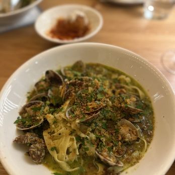 Mida - East Boston - a bowl of soup with clams - Pizza Near Me - Boston, Massachusetts