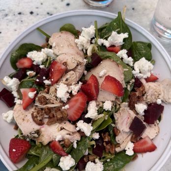 d'Alba - Salad with baby spinach, curly endive, goat's milk feta, candied pecans, local strawberries beets, lemon & roasted garlic vinaigrette - New American Near Me - Magnolia, Texas d'Alba - Salad with baby spinach, curly endive, goat's milk feta, candied pecans, local strawberries beets, lemon & roasted garlic vinaigrette - New American Near Me - Magnolia, Texas