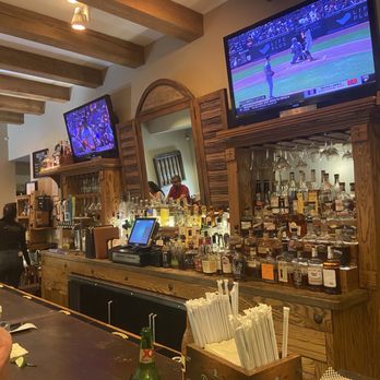 The Ranch House - Bar area, nice seating with plenty of booth sitting behind. - American Near Me - Santa Fe, New Mexico