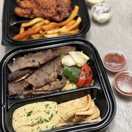 Lamb gyro plate and fish and chips