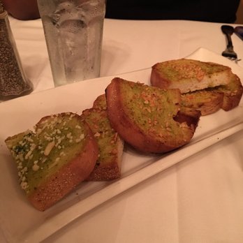 Trattoria Alberto - burnt garlic bread that another table initially refused that we were given, with non-burnt garlic bread on the left for reference. - Italian Near Me - Washington, DC, District of Columbia Trattoria Alberto - burnt garlic bread that another table initially refused that we were given, with non-burnt garlic bread on the left for reference. - Italian Near Me - Washington, DC, District of Columbia