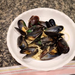 Gus & Co Seafood - Mussels cooked in shallots and white wine on homemade spaghetti