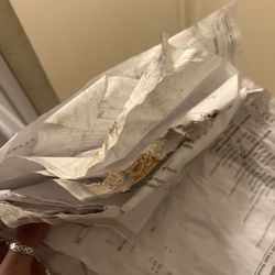 Center Service Auto Body - Papers found under car
