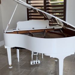 Piano Distributors of Naples - Baby grand white piano Disklavier