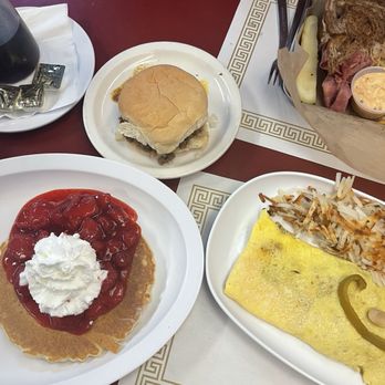 Panos Restaurant - Pancake with strawberry and whip cream topping, Greek burger, pick your own 3 ingredient omelette - New American Near Me - Erie, Pennsylvania Panos Restaurant - Pancake with strawberry and whip cream topping, Greek burger, pick your own 3 ingredient omelette - New American Near Me - Erie, Pennsylvania