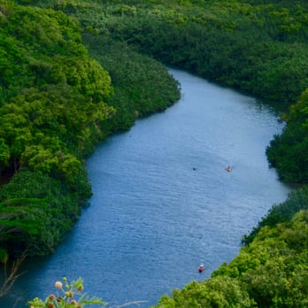 Wailua Heritage Trail - Boaters head down the Wailua River. The stream is considered the only navigable river in all of Hawaii. - Landmarks & Historical Buildings Near Me - Kapaa, Hawaii