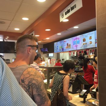 McDonald's - a man with a tattooed arm - Fast Food Near Me - Drumheller, Alberta