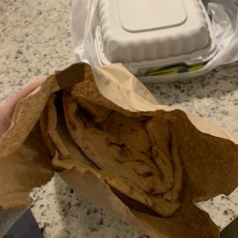 Prince Kabob - naan without wrapping touching container handled by glove-less employees - Afghan Near Me - Gambrills, Maryland