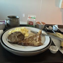 Centennial Hills Hospital Cafeteria - Breakfast, scramble eggs, French toast and 2 sausage, banana, cereal, coffee and orange juice. So much food
