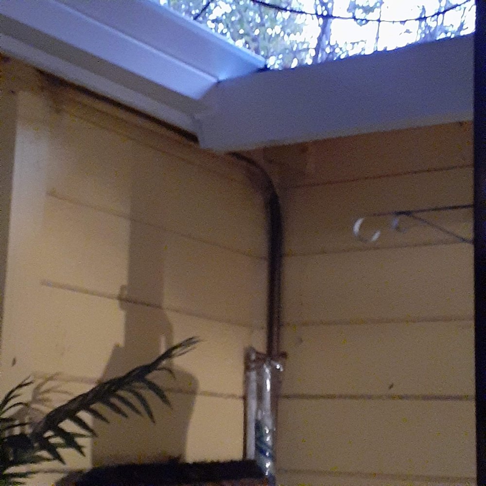 Slide of JB Rain Gutter installation