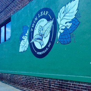 Twin Leaf Brewery - logo painted on an exterior wall...can't miss it! - Breweries Near Me - Asheville, North Carolina