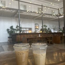 Esperanza Coffee Collective - Cinnamon snow latte and white chocolate mocha in the beautiful seating area