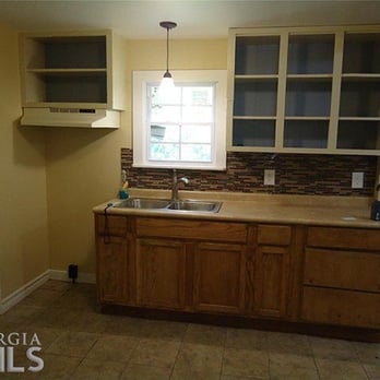 Camden Enterprises - a kitchen with a sink and cabinets - General Contractors Near Me - Princess Anne, Maryland Camden Enterprises - a kitchen with a sink and cabinets - General Contractors Near Me - Princess Anne, Maryland