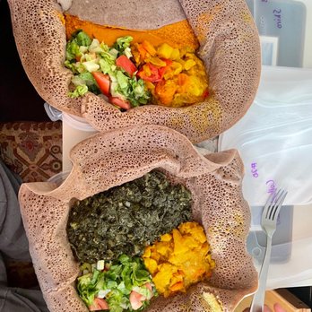 Asmara - Shiro with veggies in mild yellow stew and sautéed spinach with veggies in mild yellow stew - African Near Me - Portland, Maine