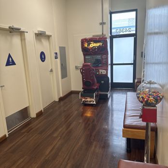 Los Pericos - Arcade and gumball machine while you wait to use the bathroom. - Mexican Near Me - Hayward, California