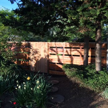 Affordable Contractor Services  - Bryon did a great job of refining the palette fence to work with the terrain changes! He also provided a gate to work with the design layout - Fences & Gates Near Me - Vancouver, Washington