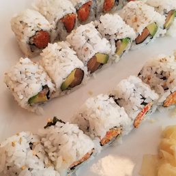 Spicy crab, spicy tuna and salmon avocado roll Spicy crab, spicy tuna and salmon avocado roll