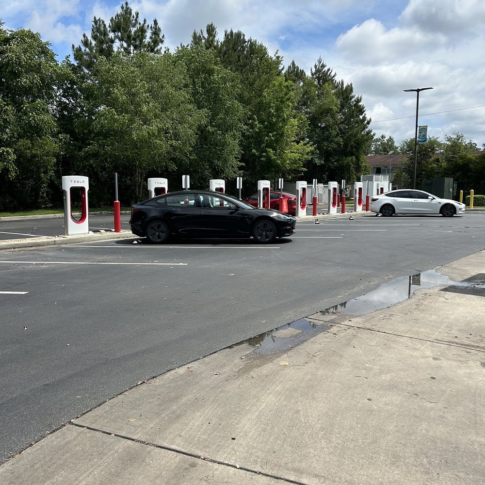 Tesla Supercharger - Tesla superchargers behind the building. - EV Charging Stations Near Me - Valdosta, Georgia Tesla Supercharger - Tesla superchargers behind the building. - EV Charging Stations Near Me - Valdosta, Georgia