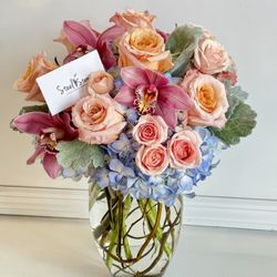 Steel Stem Floral - A delicate mixture of sweet and soft colors florals for a true friendship.