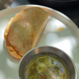 Carne Empanada with wagyu beef, bell pepper, egg with chimichurri. Good flavors.