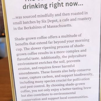 Congamond Coffee - A printed sign explains the sourcing, environmental benefits, and flavor profile of shade-grown coffee at Congamond Coffee & Cafe. - Cafes Near Me - Southwick, Massachusetts