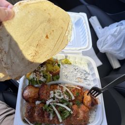Chicken breast kabob, addl chicken lule with Greek salad and yogurt / cucumber Chicken breast kabob, addl chicken lule with Greek salad and yogurt / cucumber
