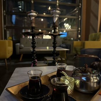 Basha Social Lounge - a tray of tea and coffee cups on a table - Hookah Bars Near Me - Denver, Colorado Basha Social Lounge - a tray of tea and coffee cups on a table - Hookah Bars Near Me - Denver, Colorado