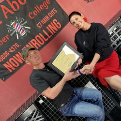 Cutz Above Barber College - Owner, Lee Smith, presenting certificate to Bridget. Congratulations!
