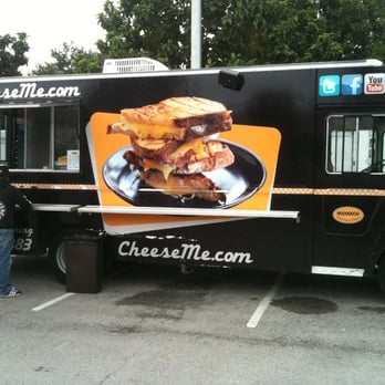CheeseMe Mobile - people standing in front of a food truck - Food Stands Near Me