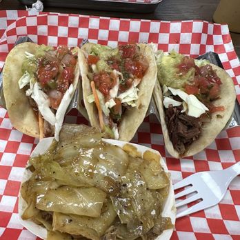 Uncle Tony's Backyard Bbq - Three tacos. Pulled pork, pulled chicken and pulled brisket. Along with the side of the sautéed cabbage! - Barbeque Near Me - Orlando, Florida Uncle Tony's Backyard Bbq - Three tacos. Pulled pork, pulled chicken and pulled brisket. Along with the side of the sautéed cabbage! - Barbeque Near Me - Orlando, Florida
