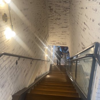 Rusk Kitchen & Bar - Stairs leading from the roof top down to the indoor restaurant - Cocktail Bars Near Me - Cincinnati, Ohio