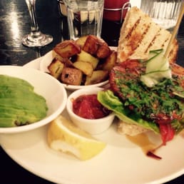 Tempeh burger with the Rustic Potatoes and a side of Avocado !