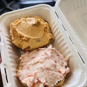 Bagelfeld's - Fix'd Up: bagel with two different cream cheese split half-and-half Pepper and Garlic cream cheese (top) Smoked salmon cream cheese (bottom) - Bagels Near Me - Phoenix, Arizona