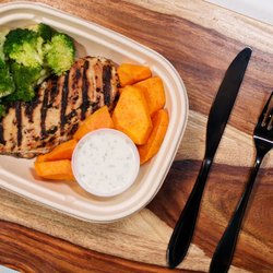 Fetch Meal Prep - Ever craved chicken and veggies? Get ready to after you try ours with secret sauce to top it off!